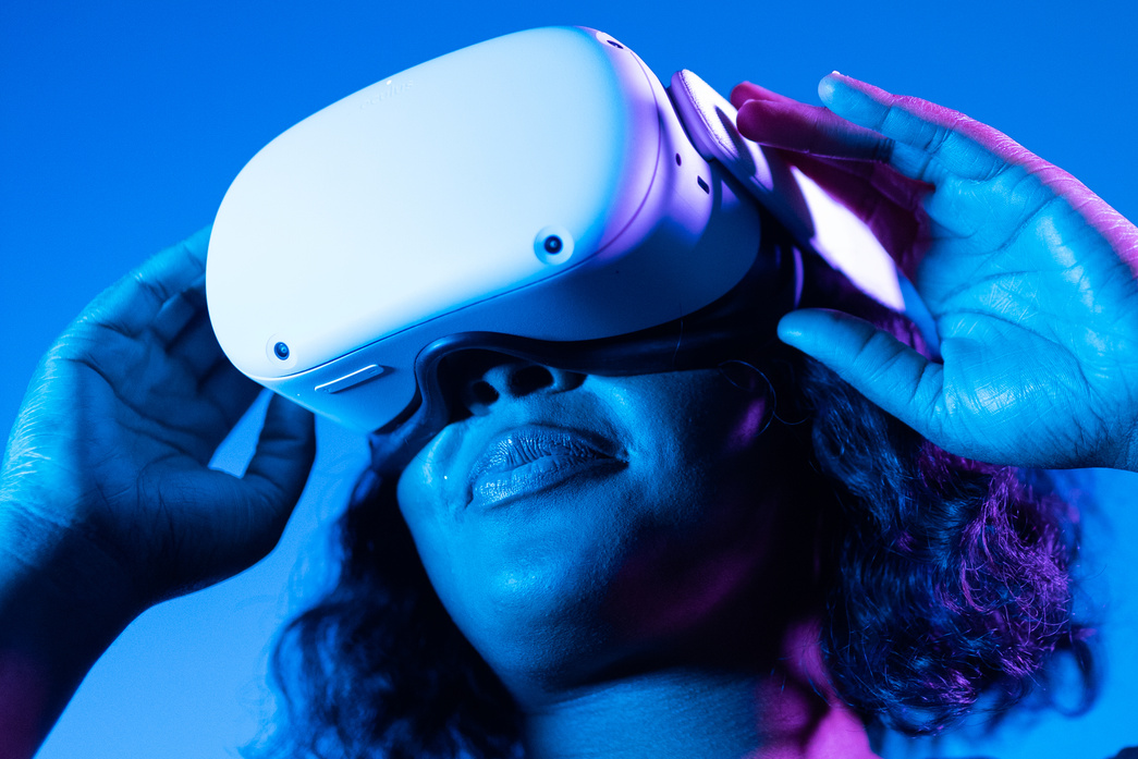 Woman Playing Online Game with VR Headset